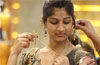 Gold price hits 14-month high, surges to Rs 31,450 per 10 gram